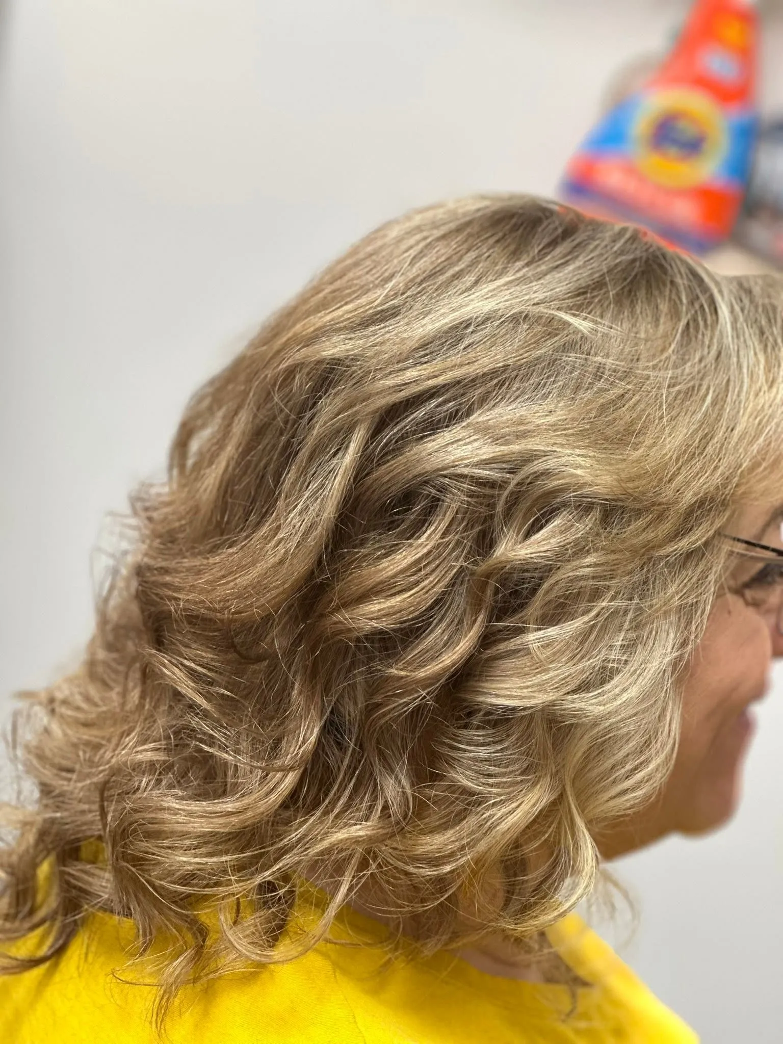 Polished, evened-out blonde color at Miracles Salon & Spa
