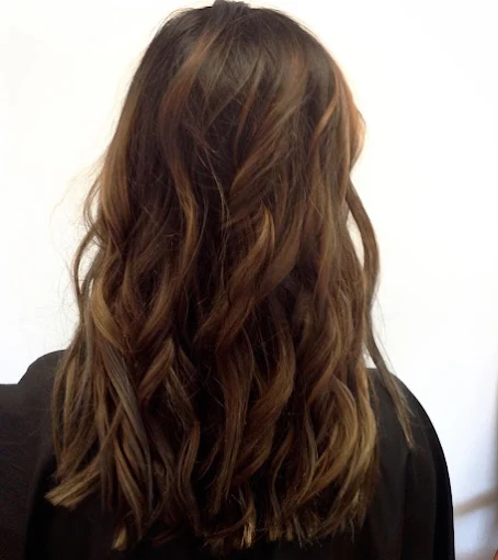 Rich brunette balayage with subtle warmth at Miracles Salon & Spa in Shallotte, NC