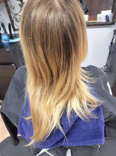 Blonde balayage with a graduated ombre at Miracles Salon & Spa in Shallotte, NC