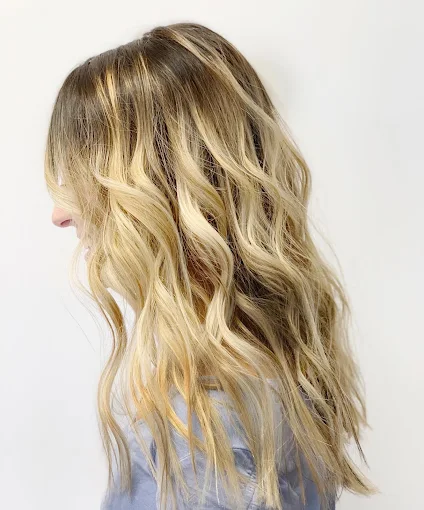 Beachy blonde balayage, side view, at Miracles Salon & Spa in Shallotte, NC