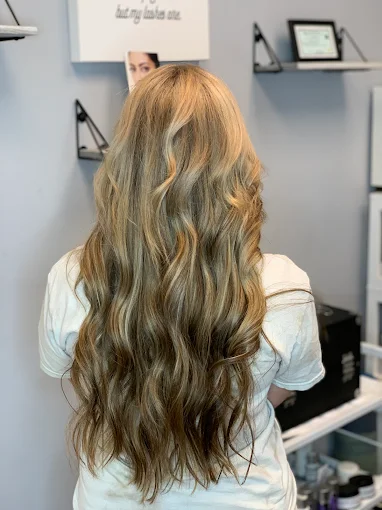 Warm strawberry-blonde dimensional color at Miracles Salon & Spa in Shallotte, NC