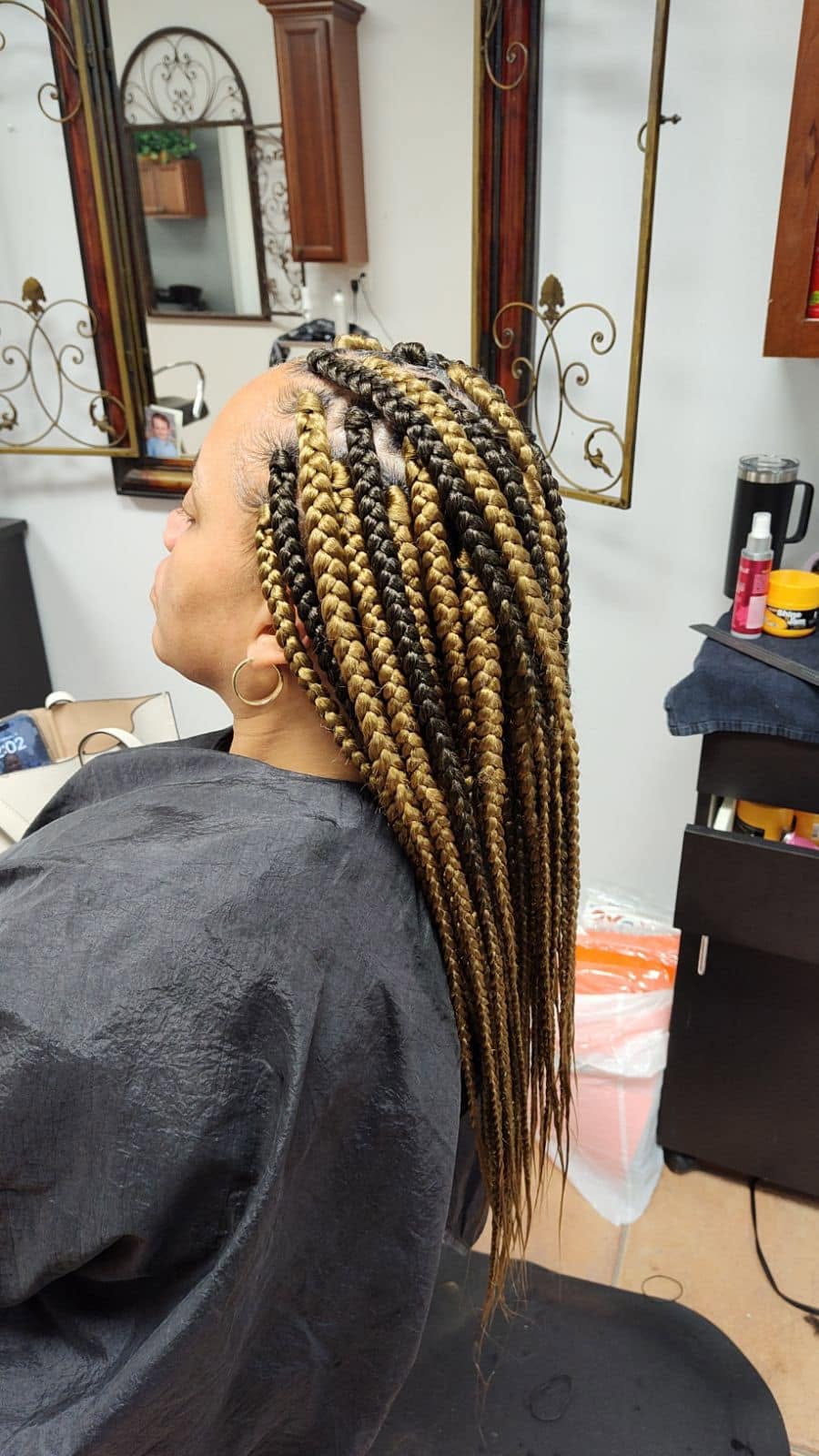 Blonde ombre box braids, side view, at Miracles Salon & Spa in Shallotte, NC
