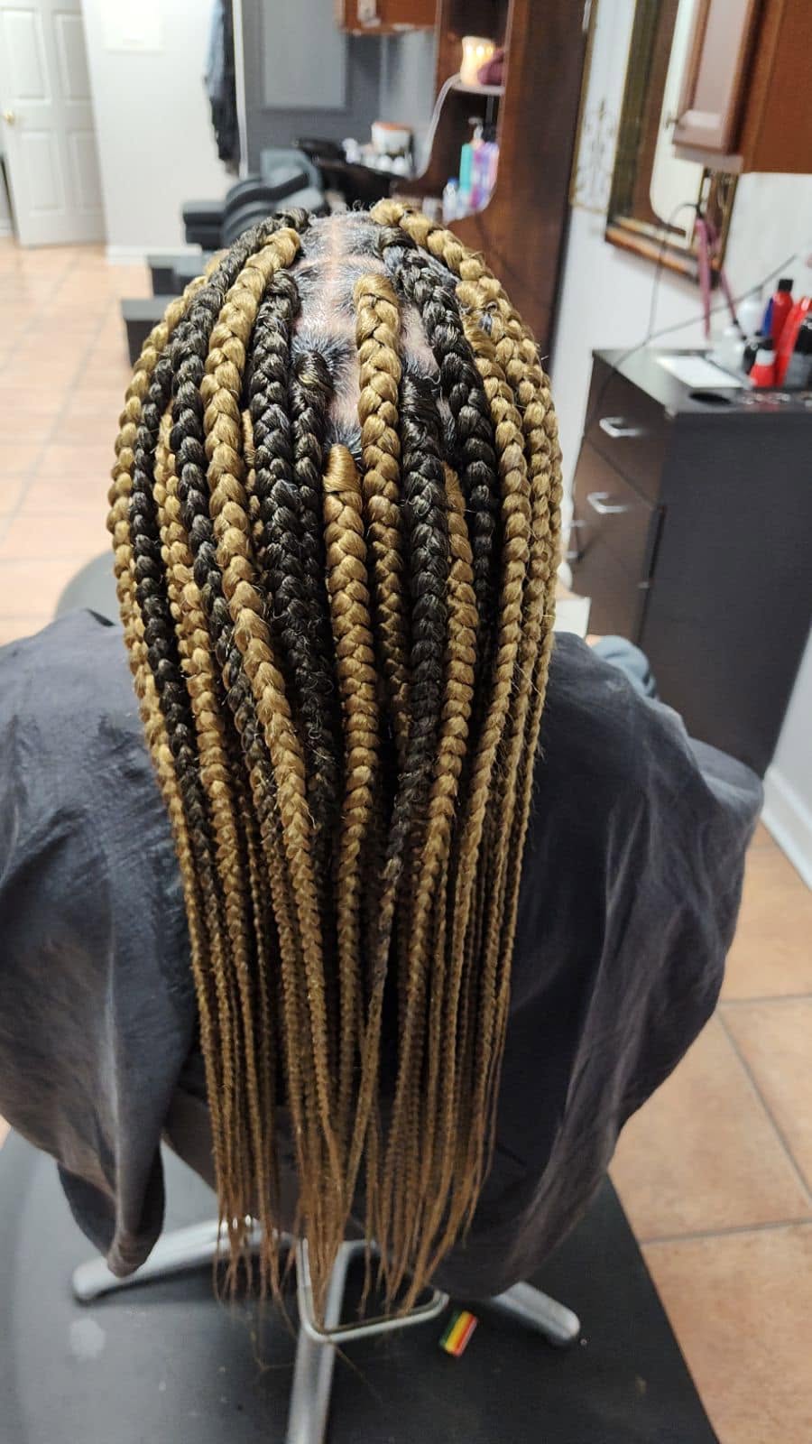 Blonde ombre box braids, back view, at Miracles Salon & Spa in Shallotte, NC