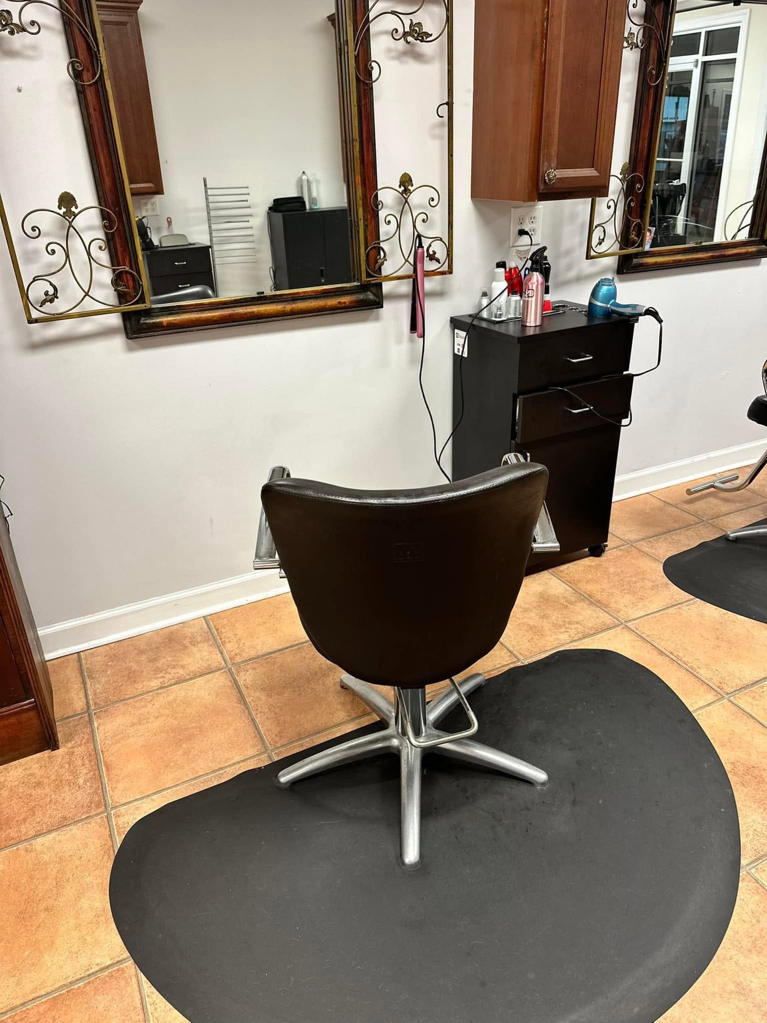 A styling chair and mirror at Miracles Salon & Spa in Shallotte, NC