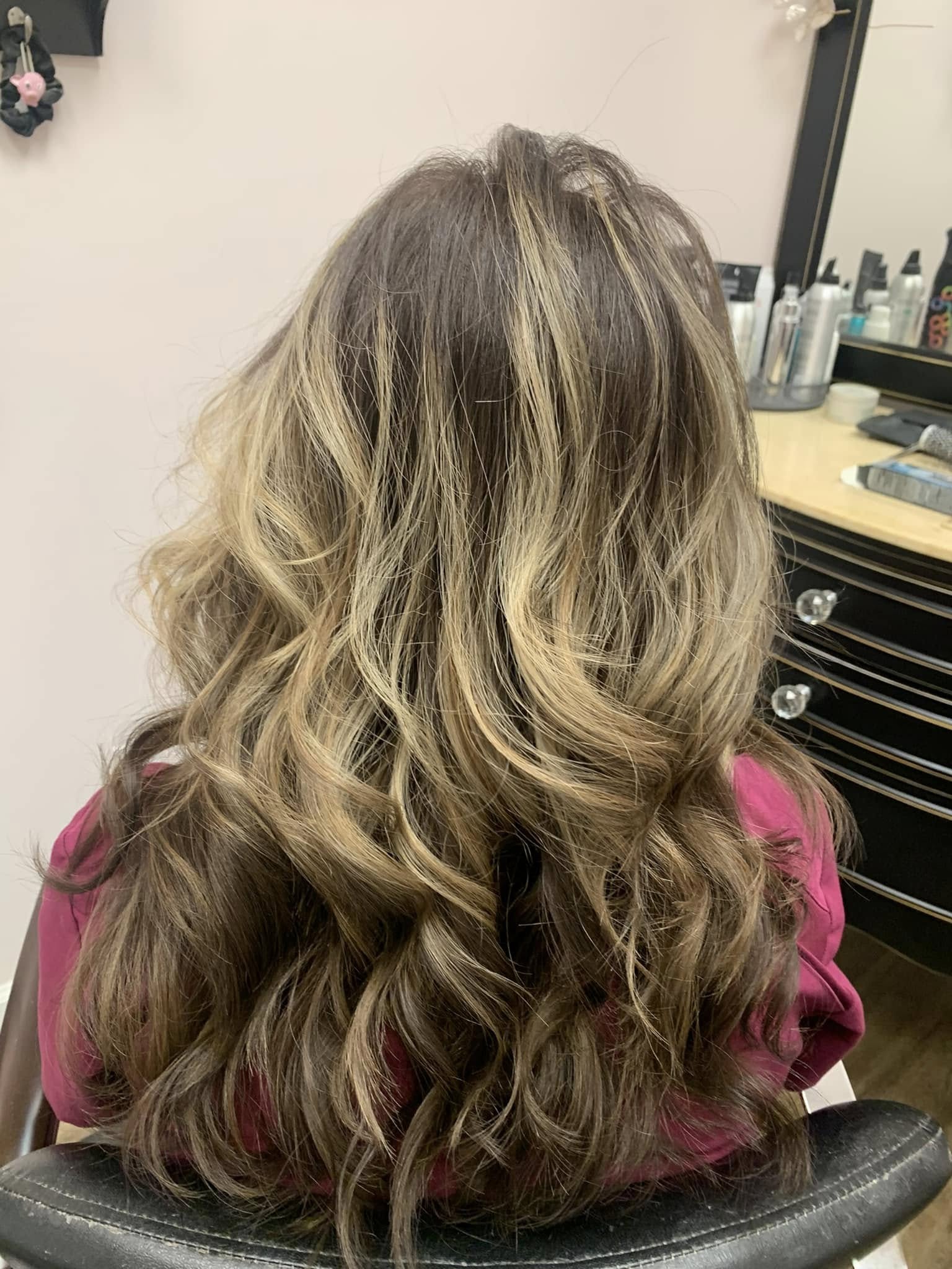 Long layers with a bouncy blowout at Miracles Salon & Spa in Shallotte, NC