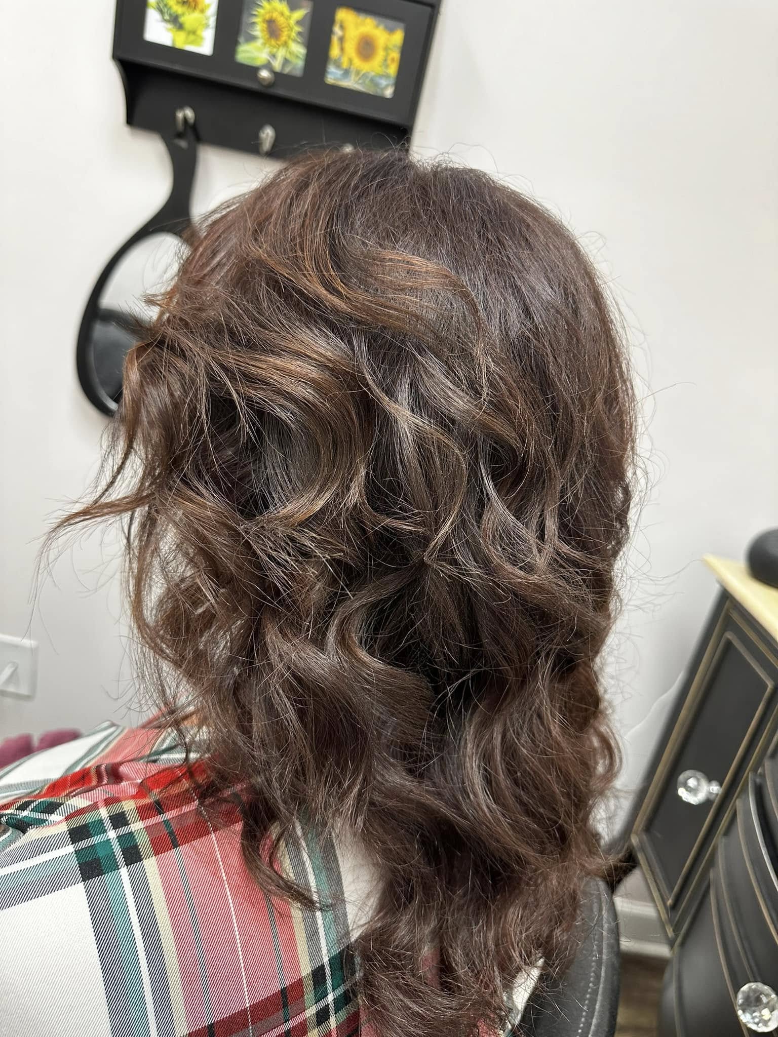 Brunette blowout with subtle dimension at Miracles Salon & Spa in Shallotte, NC