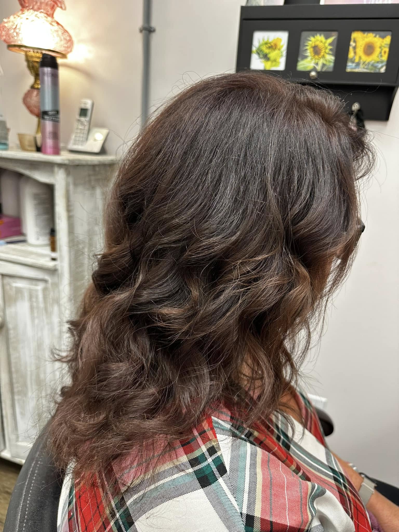 Brunette curls with movement at Miracles Salon & Spa in Shallotte, NC