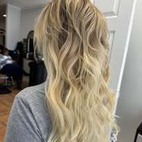 Dimensional blonde balayage, back view, at Miracles Salon & Spa in Shallotte, NC