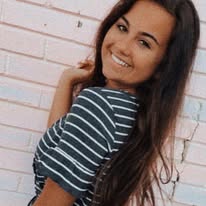 Long, healthy brunette style at Miracles Salon & Spa in Shallotte, NC